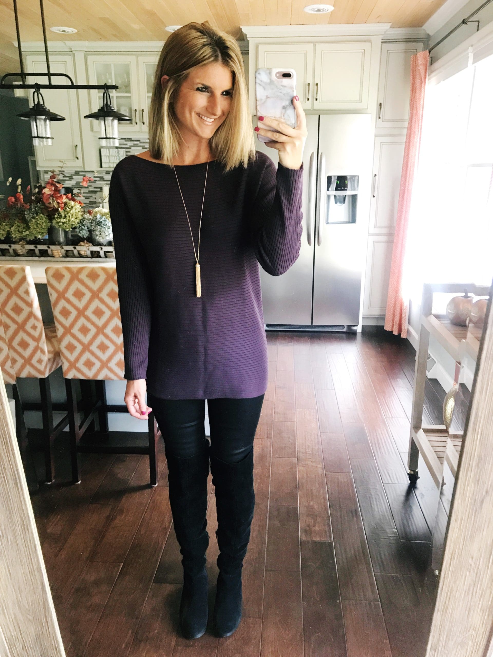 How to Wear Tall Black Boots with Skinny Jeans